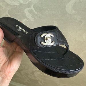 CHANEL Black Sandals with Metallic Logo